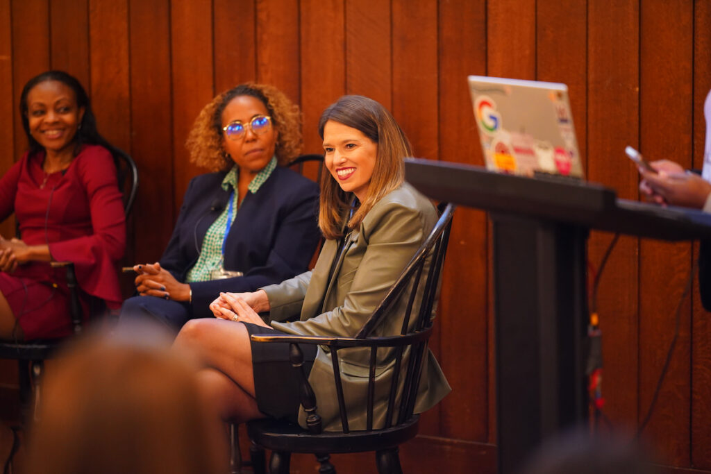 Wharton MBAs Jennifer Kopylov, Leslie Reyes and Melissa Christian, as Zoddy Imoisili presents